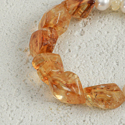 Faceted amber citrine bracelet beads with small white pearl accents