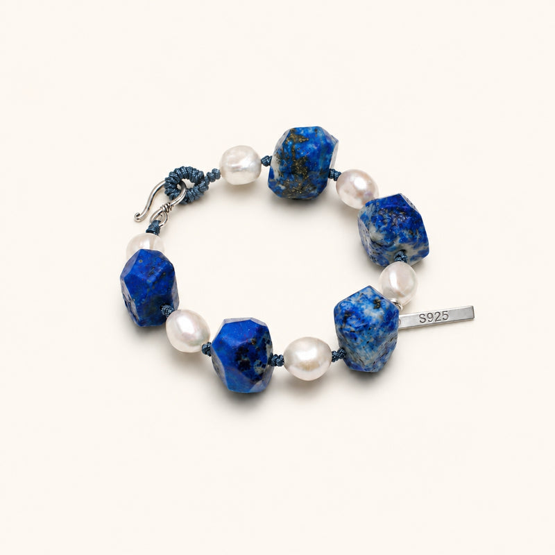 Lapis lazuli beaded bracelet with white pearls, blue macrame cord, and S925 tag