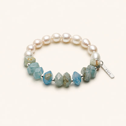 Pearl and blue gemstone stretch bracelet with silver S925 tag and faceted stones