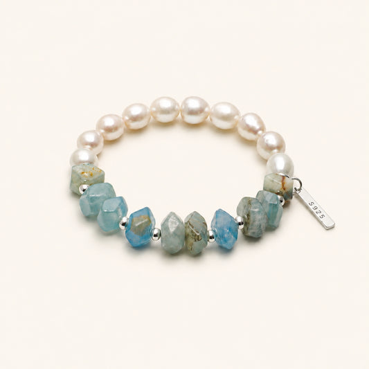 Pearl and blue gemstone stretch bracelet with silver S925 tag and faceted stones