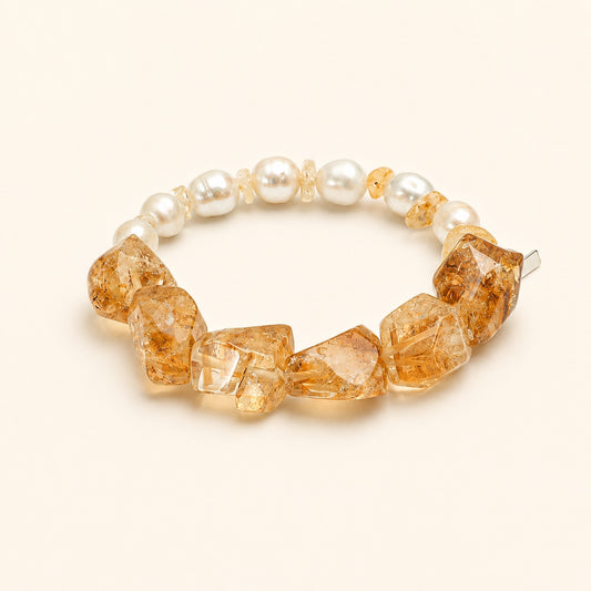 Citrine and pearl bracelet featuring amber faceted stones and round white pearls