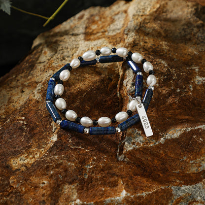 Lapis and pearl bracelet with black beads, silver spacers, and S925 tag