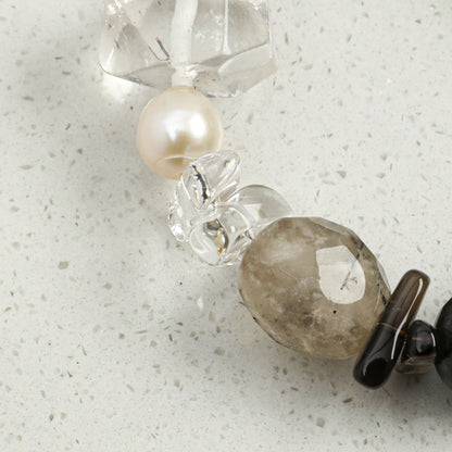 Crystal and pearl bracelet with white pearl bead, clear crystals, and smoky gray stone