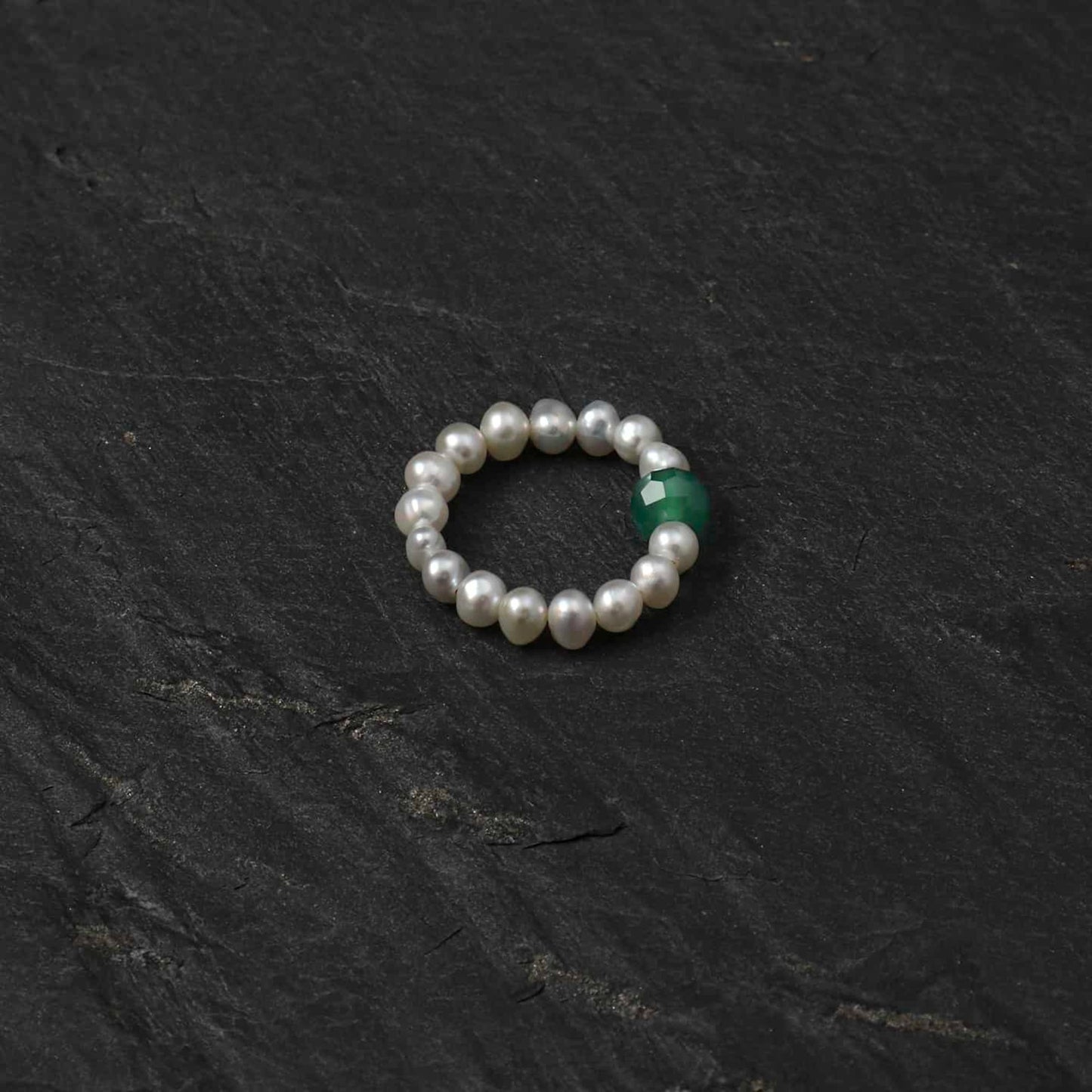 Pearl bead ring with green round gemstone accent, round beaded band