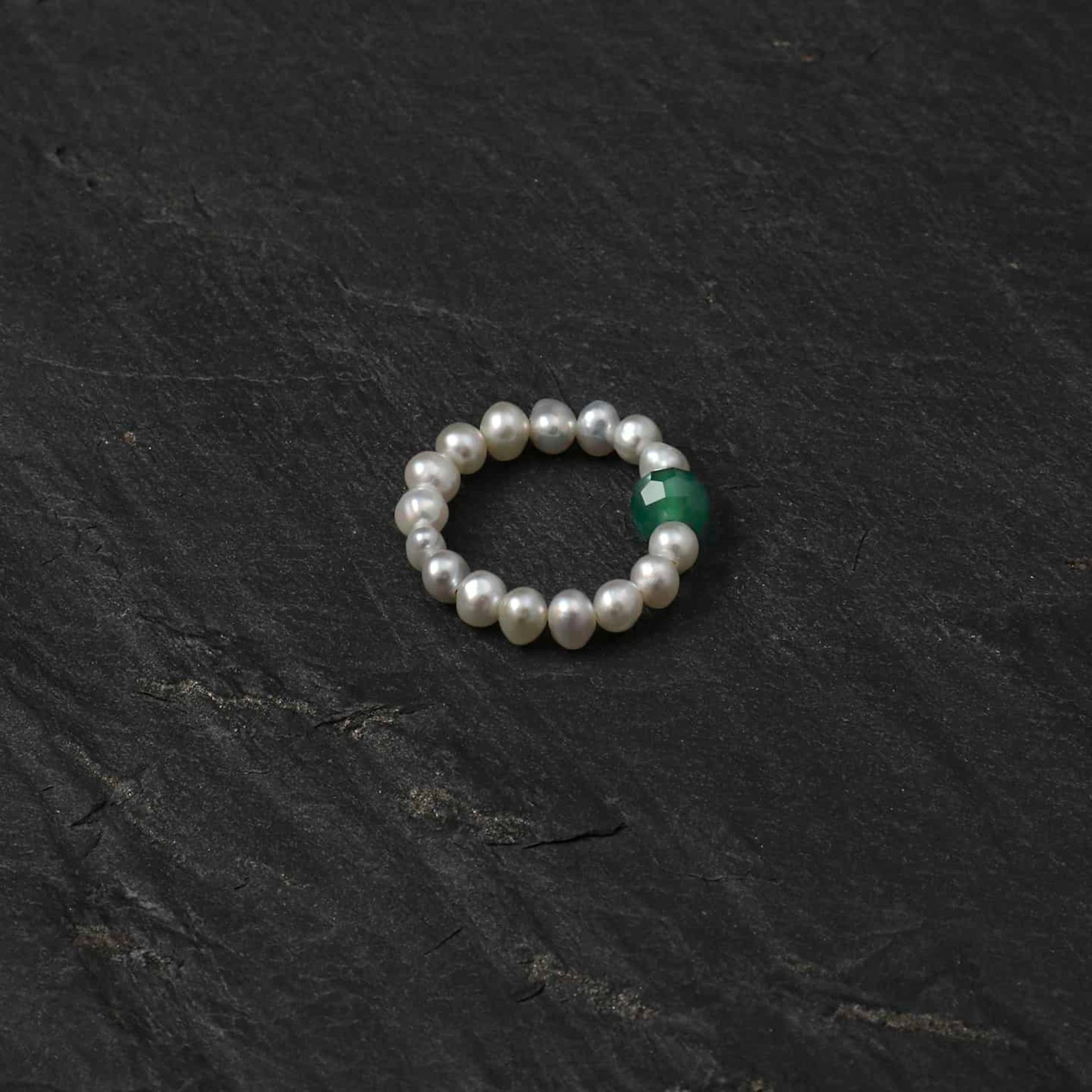 Pearl bead ring with green round gemstone accent, round beaded band
