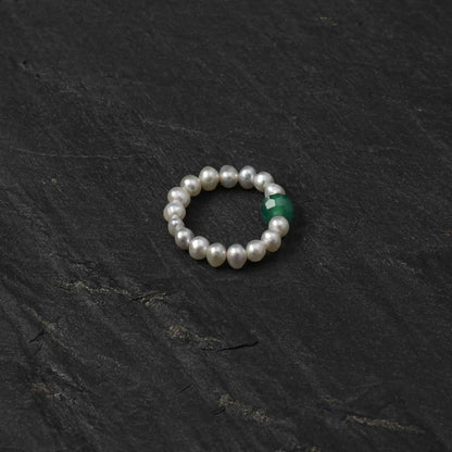 Pearl bead ring with green round gemstone accent, round beaded band