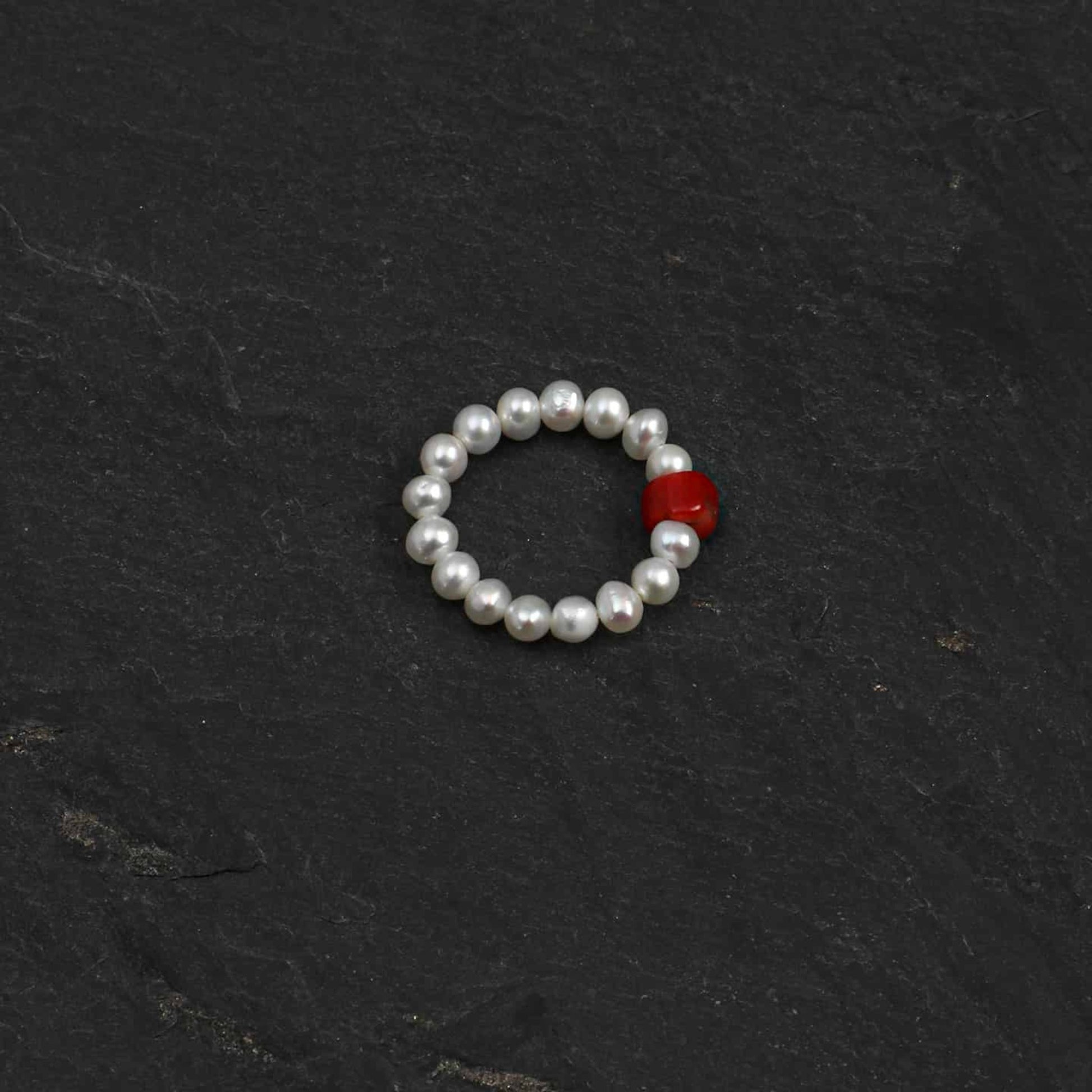 Pearl bead ring with red round gemstone accent, round beaded band