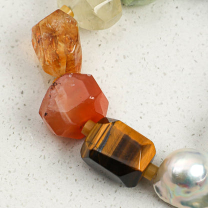 Orange to amber faceted crystal bead bracelet with round silver pearl charm