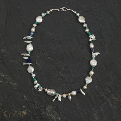 Baroque pearl gemstone necklace with silver tone links and small bird charms