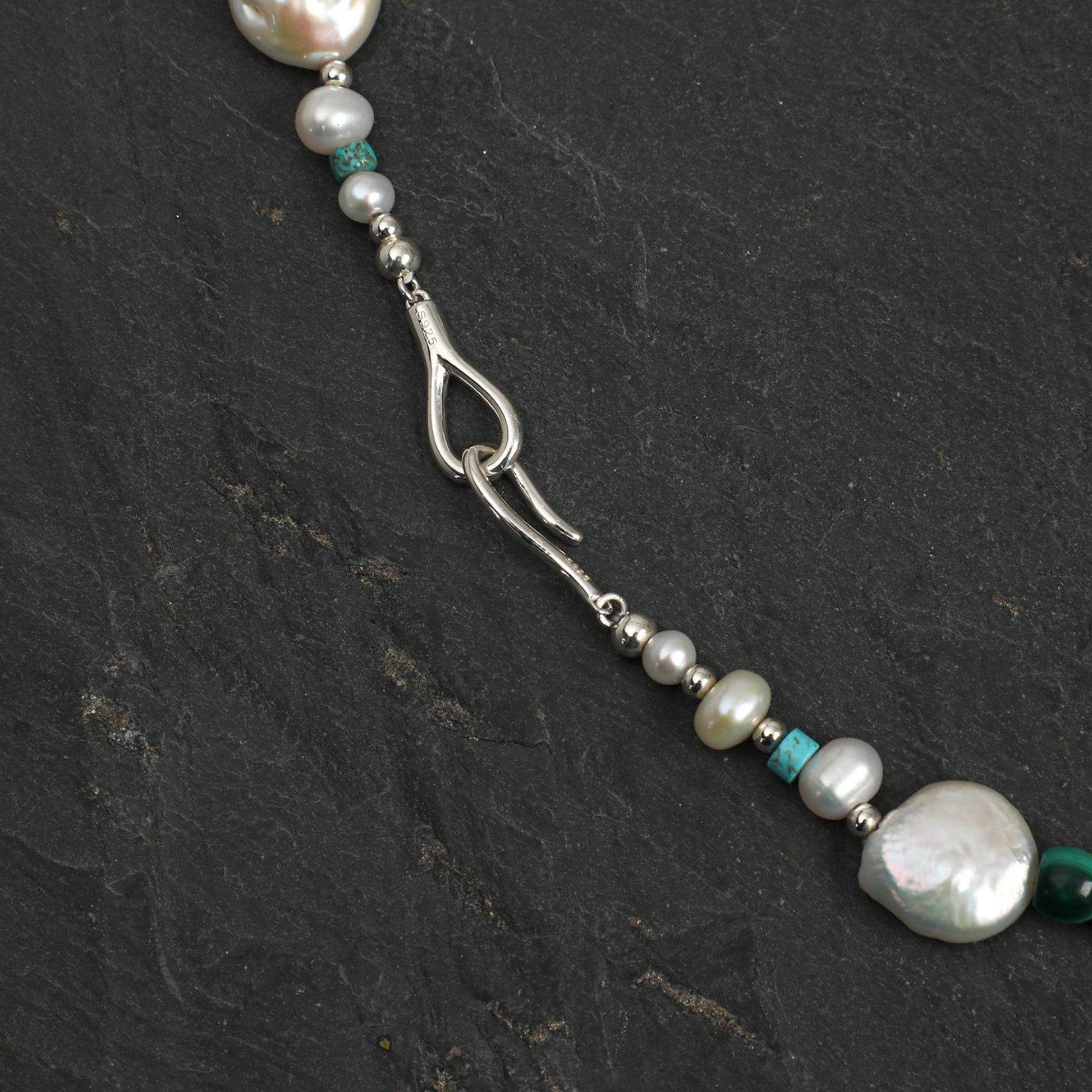 Silver-toned necklace with teardrop link, baroque pearl beads, and blue-green accents