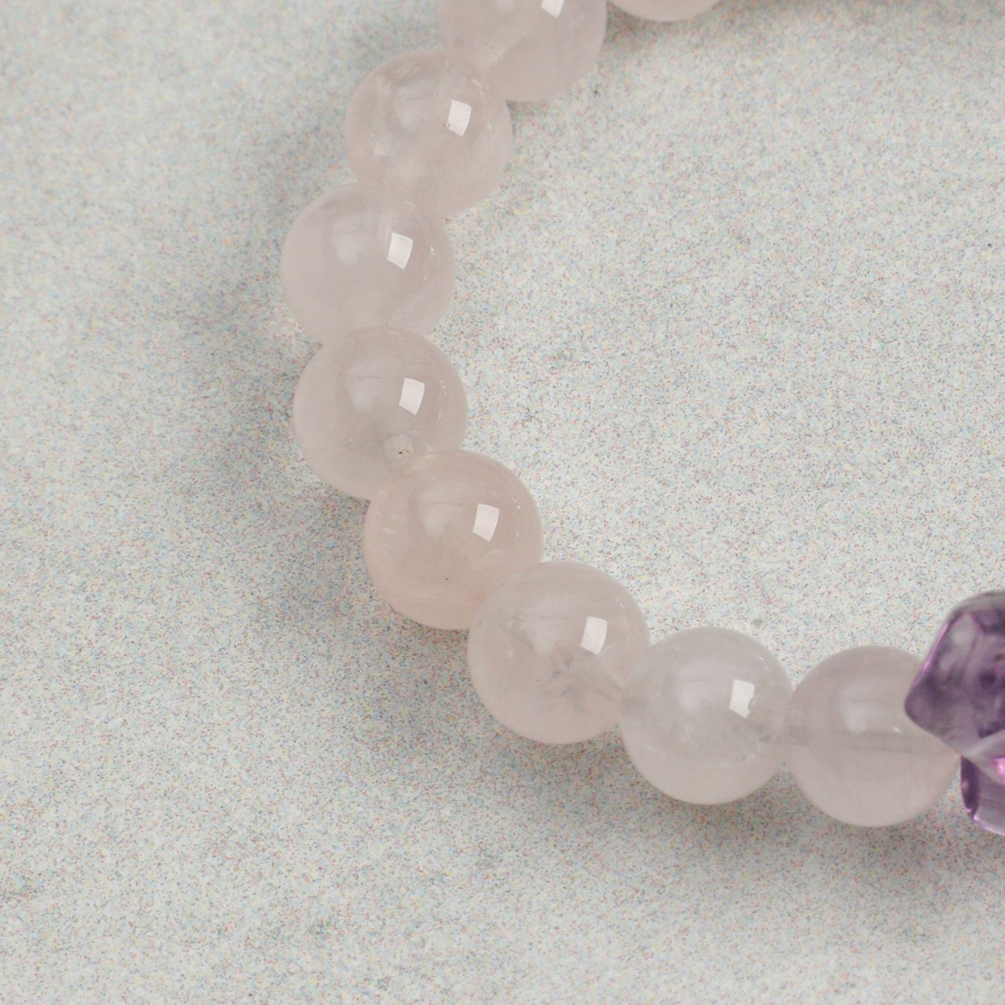 Rose quartz bead strand bracelet with smooth rounded pink beads