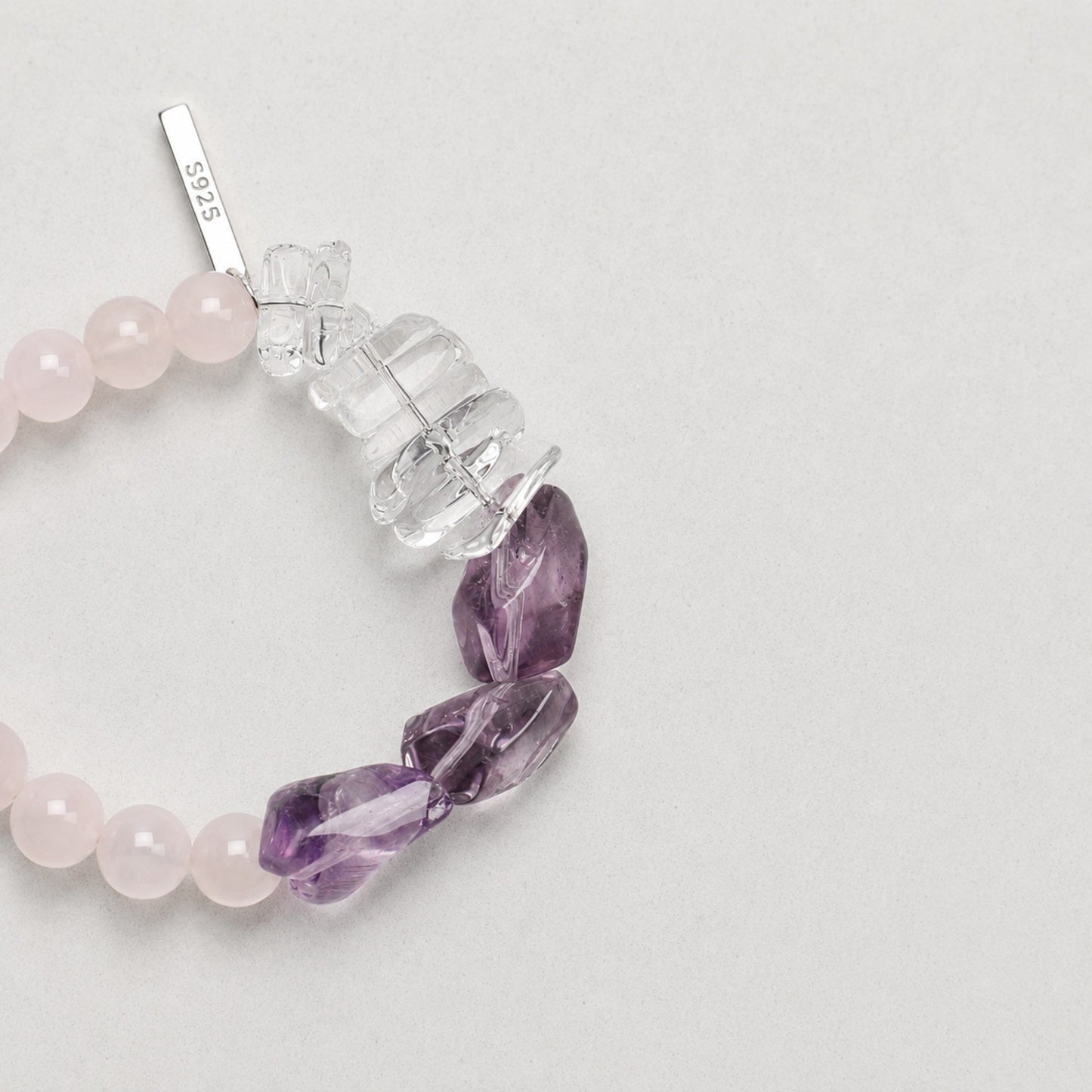 Beaded bracelet with rose quartz beads, faceted amethyst stones, 925 clasp tag