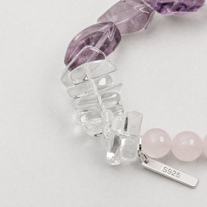 Amethyst and clear quartz bracelet detail with rose quartz beads and silver clasp