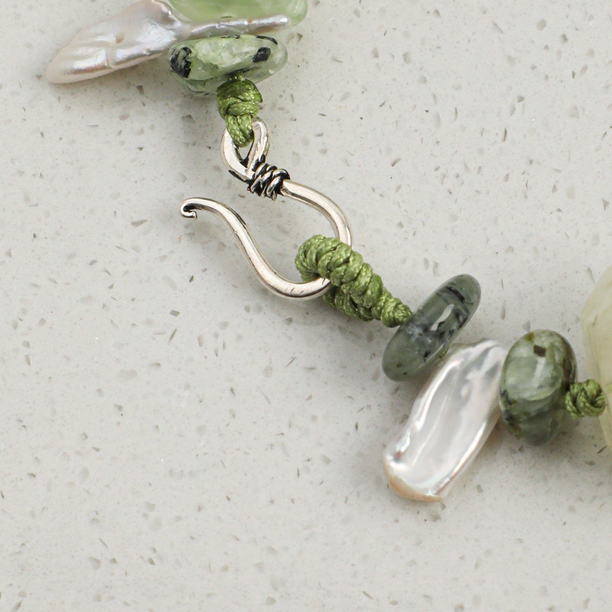 Green prehnite and pearl bracelet with silver hook clasp and faceted stone beads